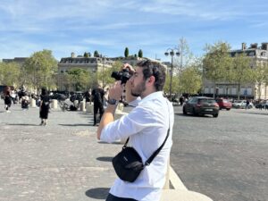 photographer taking a picture on a European street