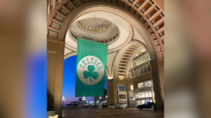 boston celtics flag flying in beautiful building