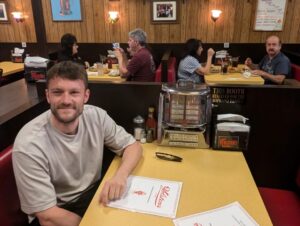 Man sitting at restaurant table